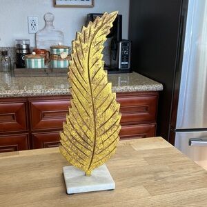Gold wooden Leaf on Marble Base